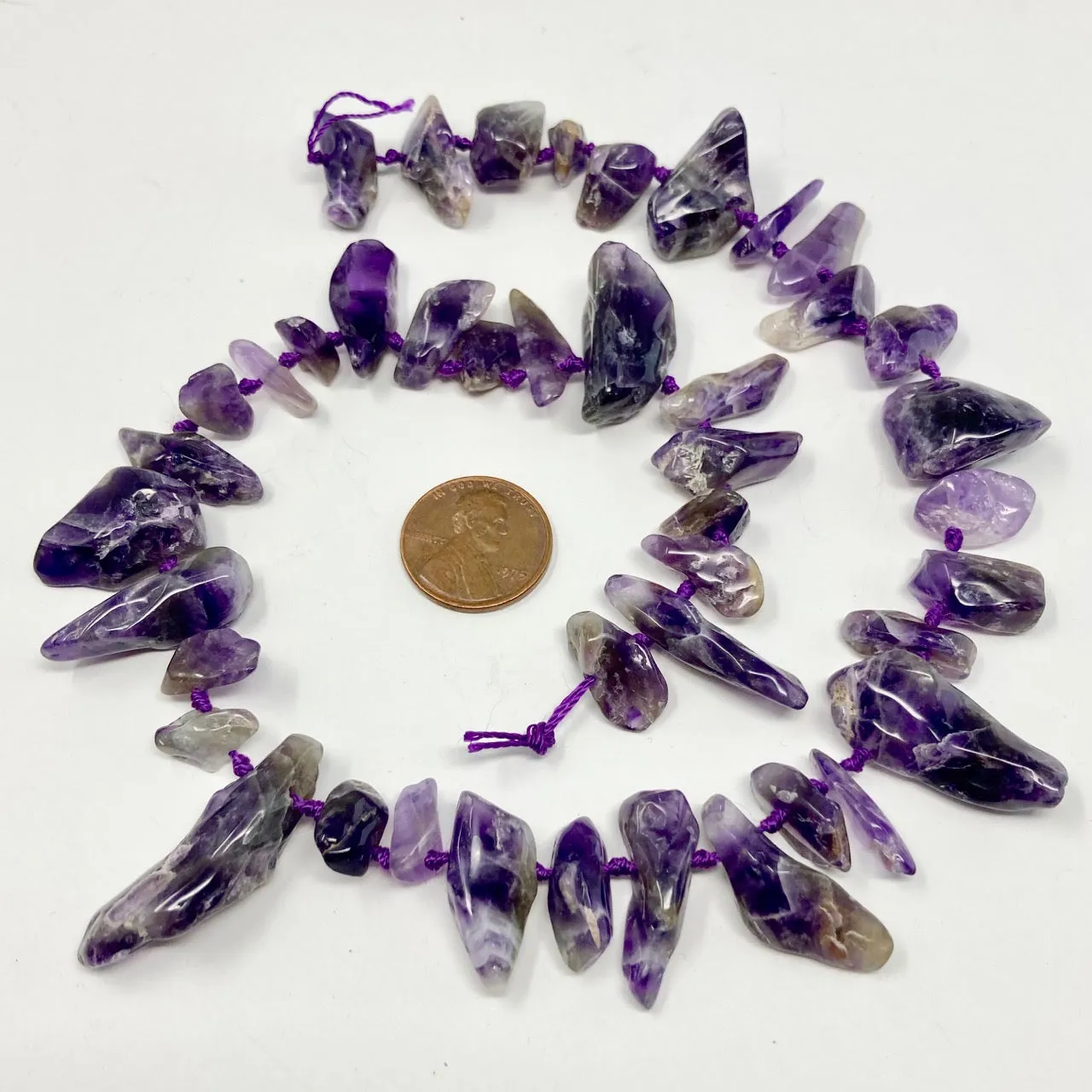 Amethyst Freeform Nuggets & Chips, 16-inch strand with knots between beads