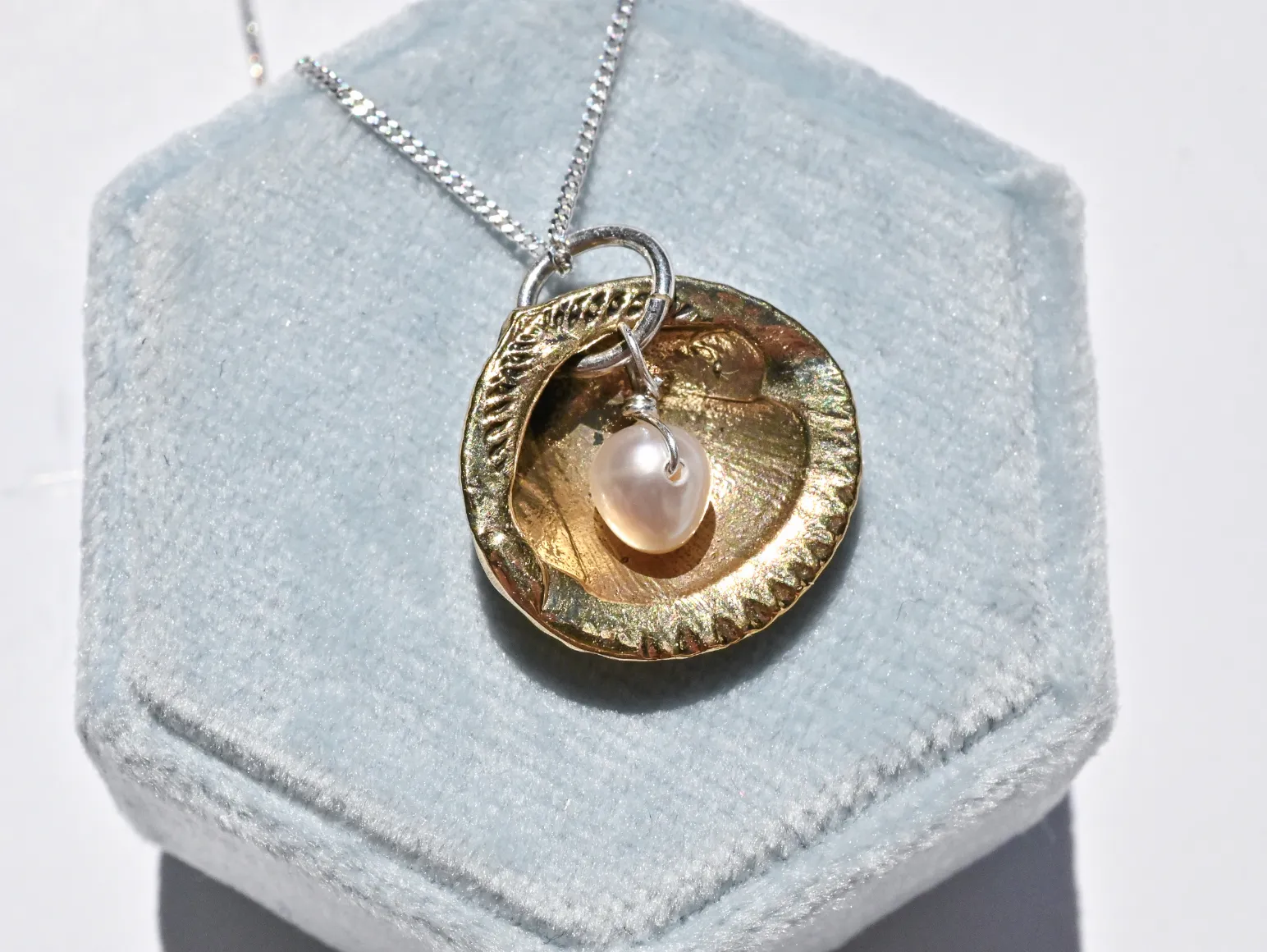 Bronze Cast Shell with Pearl Pendant