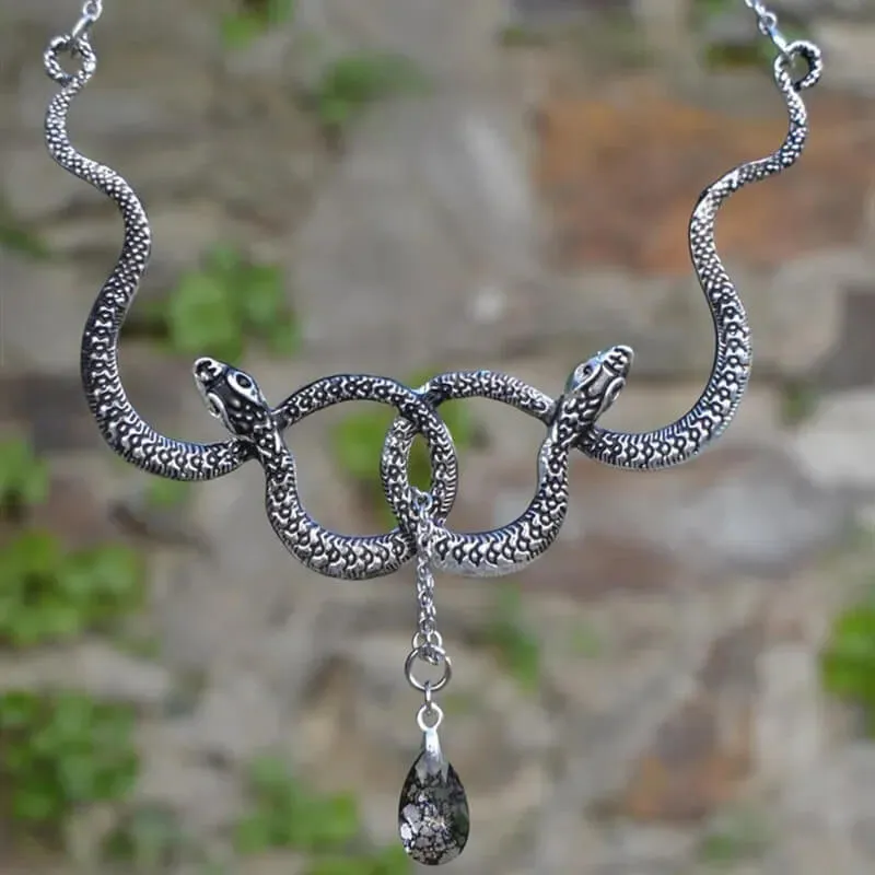 Intertwined Snakes With Poison Drop Necklace