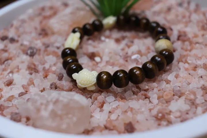 Ivory Turtle Elastic Wood Bead Bracelet by Theiss Tye Dye Studio