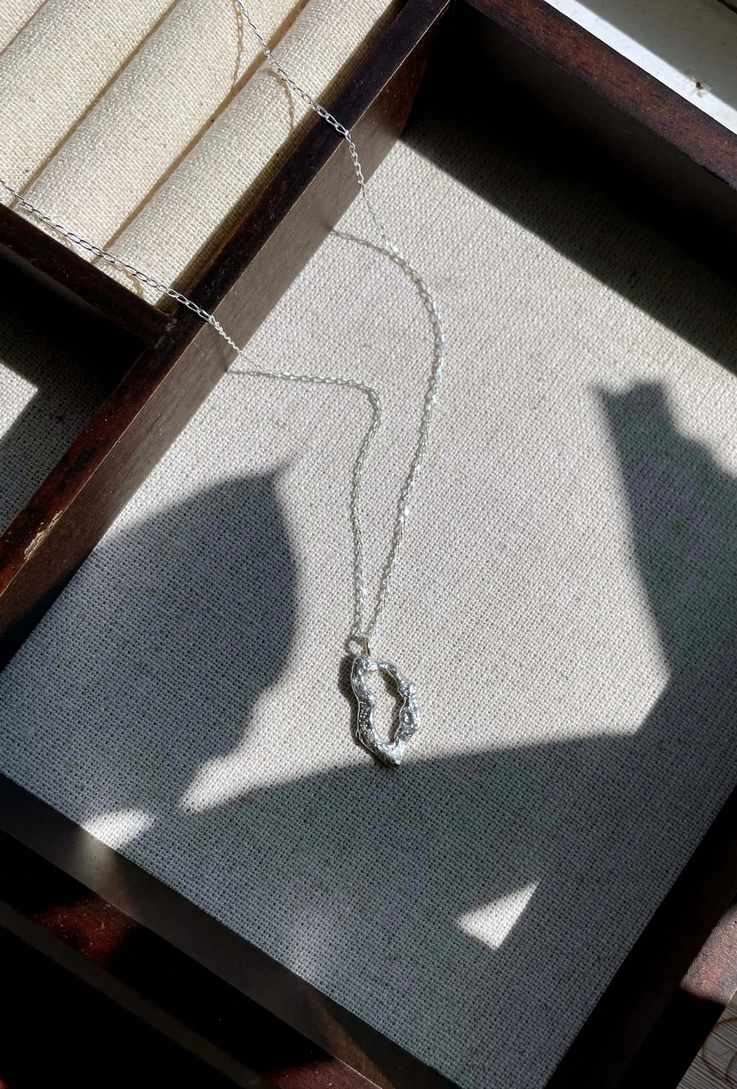 MAYA - Organic shaped oval pendant necklace