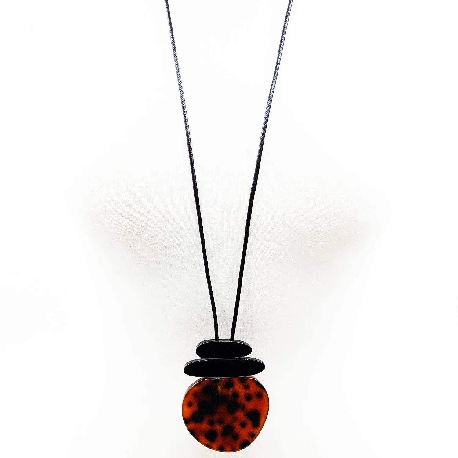 Organic round shape tortoiseshell long resin pendant