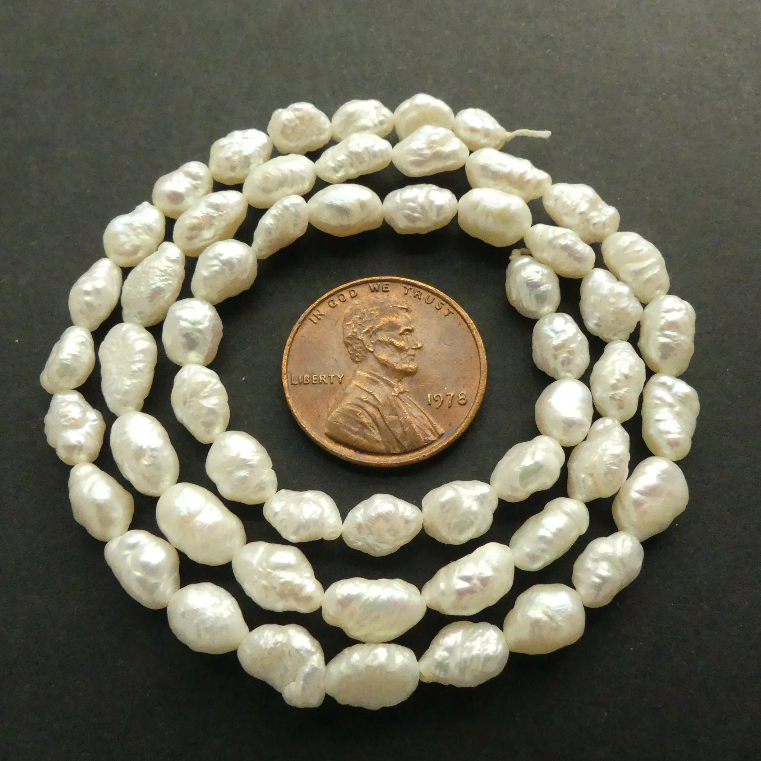 Pearls, White, Baroque Rice Shape, 7x5mm on 16-inch Strands