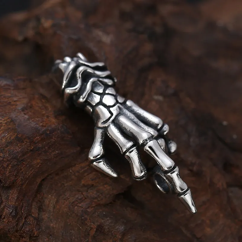 Rebel’s Wrath - Gothic Skeletal Hand Pendant by The Nevermore