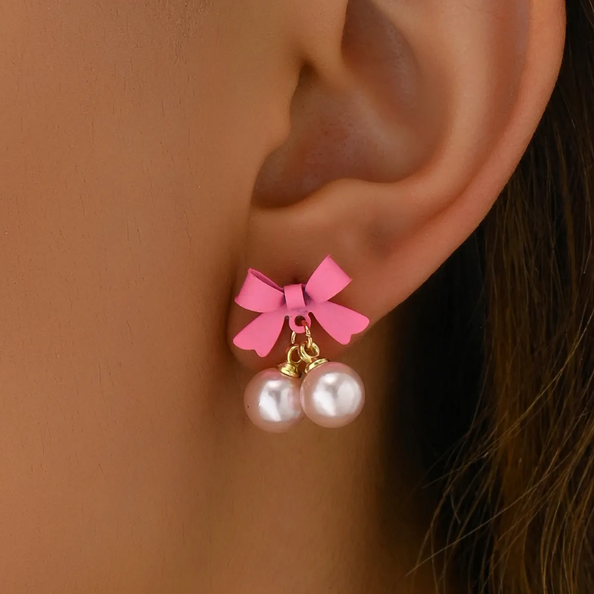 Wholesale Simple Bow Inlaid Pearl Earrings