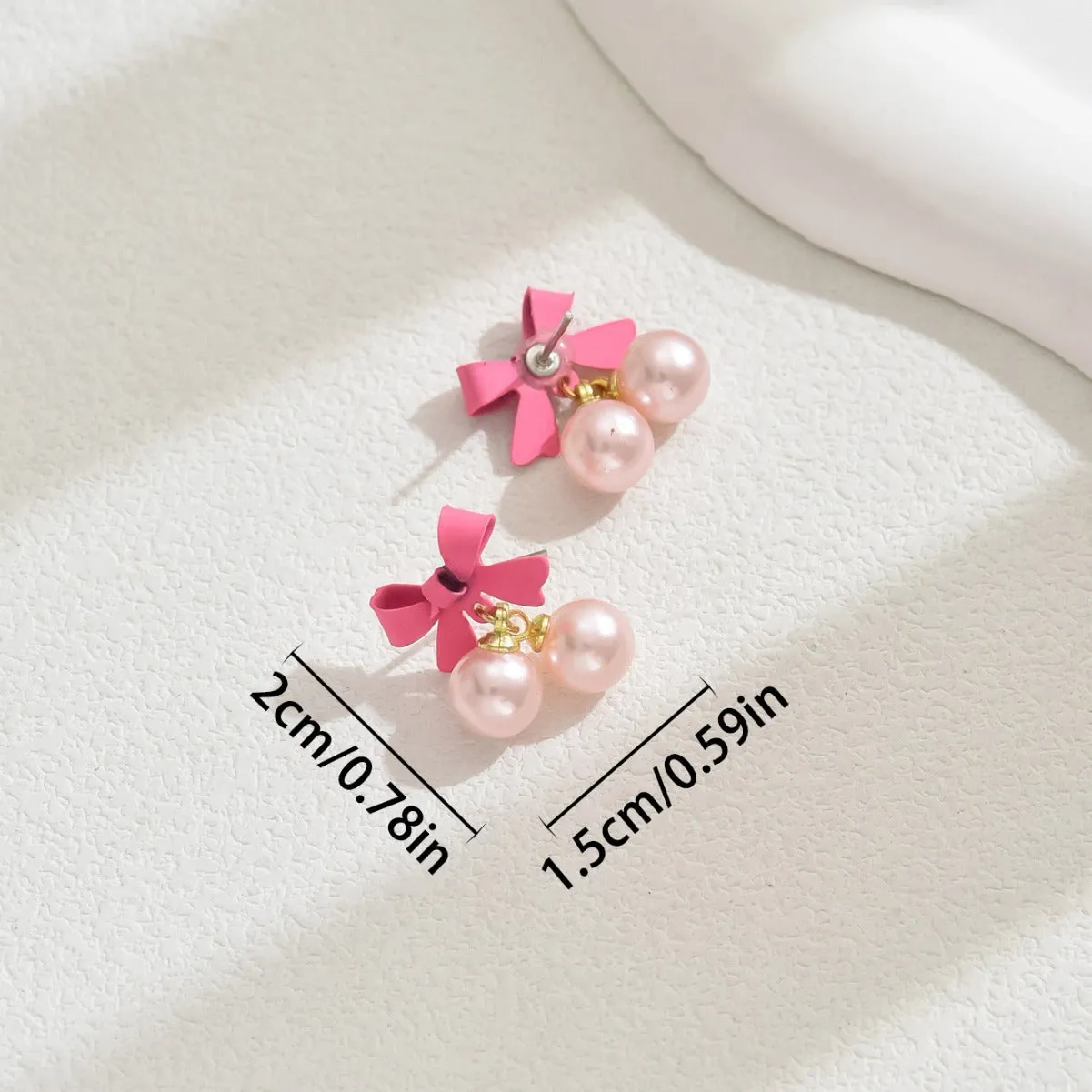 Wholesale Simple Bow Inlaid Pearl Earrings